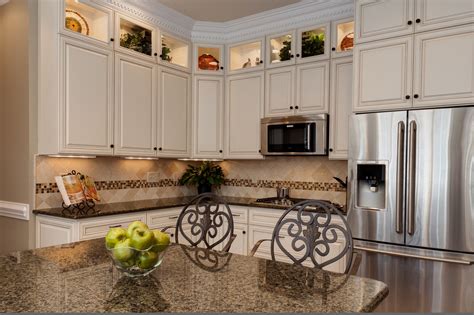 white cabinets brown granite countertops